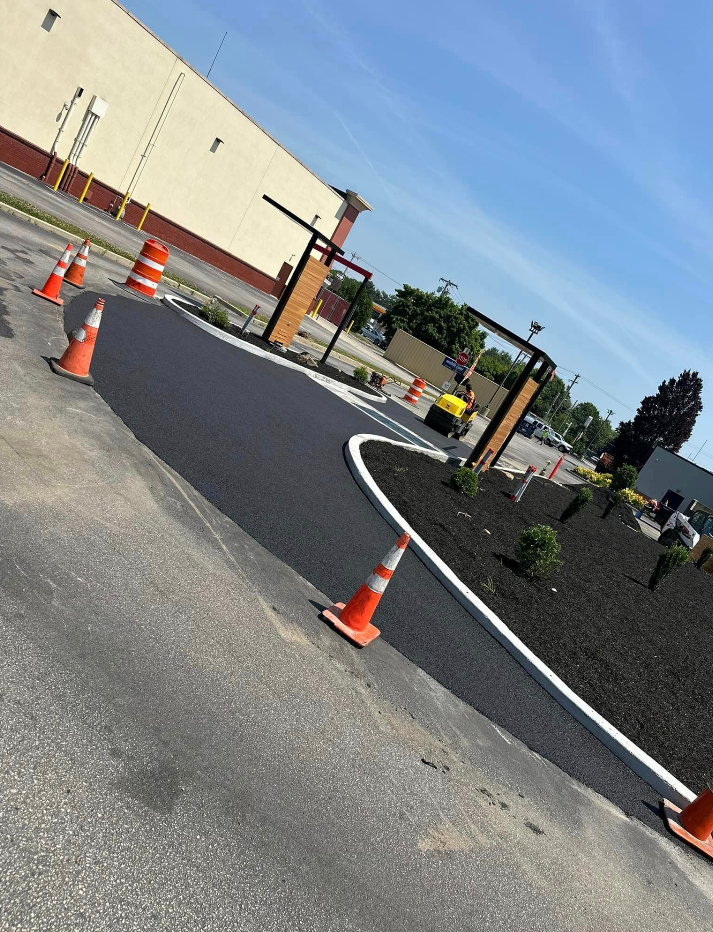 A road that has been blocked off by orange cones