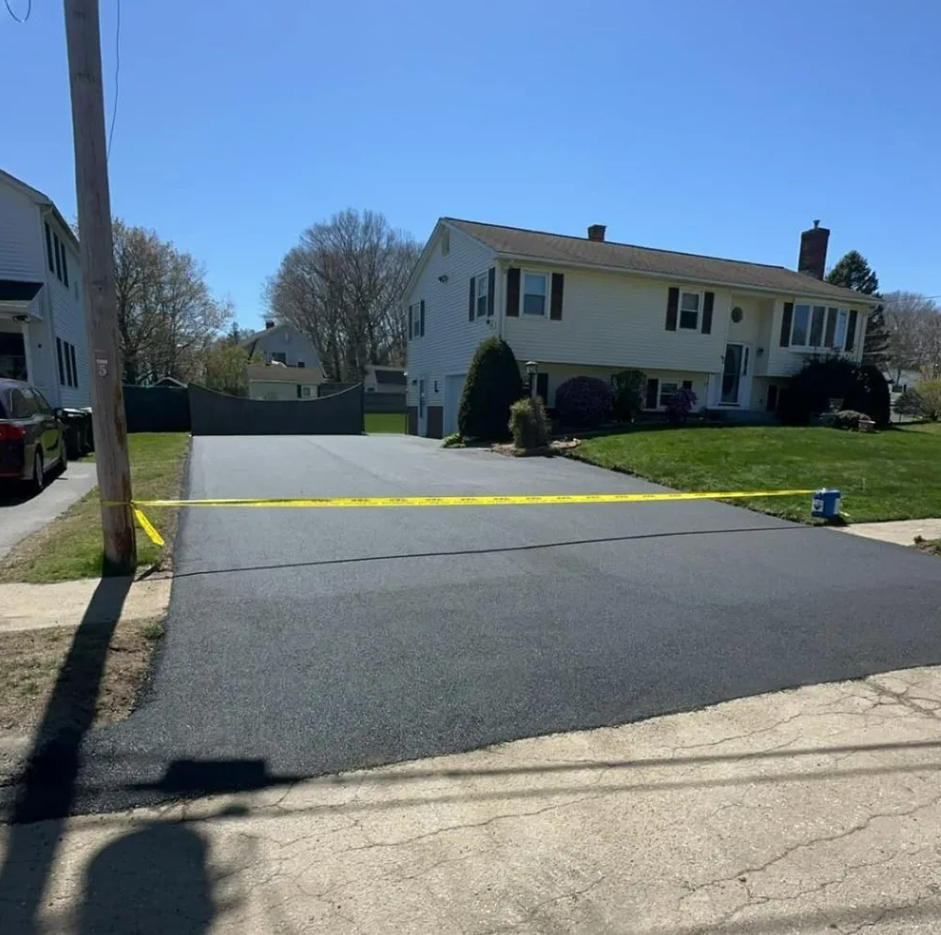 A street with a yellow caution tape on the side of it